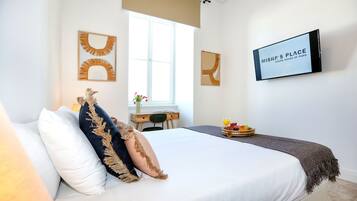 Coffres-forts dans les chambres, fer et planche Ă repasser