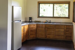 Fridge, stovetop, coffee/tea maker, electric kettle