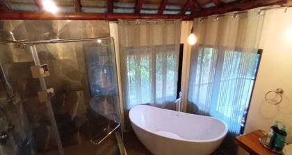 Luxury rainforest villa with private waterfalls - off grid experience