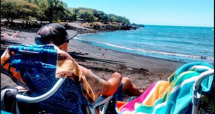Hidden Tiki Ohana at Punalu'u Black Sand Beach with ocean views, near Volcano National Park