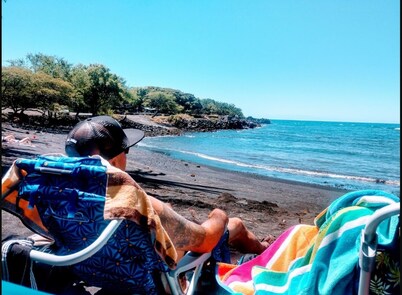 Hidden Tiki Ohana at Punalu'u Black Sand Beach with ocean views, near Volcano National Park
