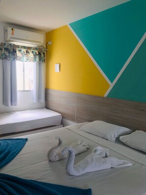 Habitación cuádruple Confort | Wifi gratis y ropa de cama