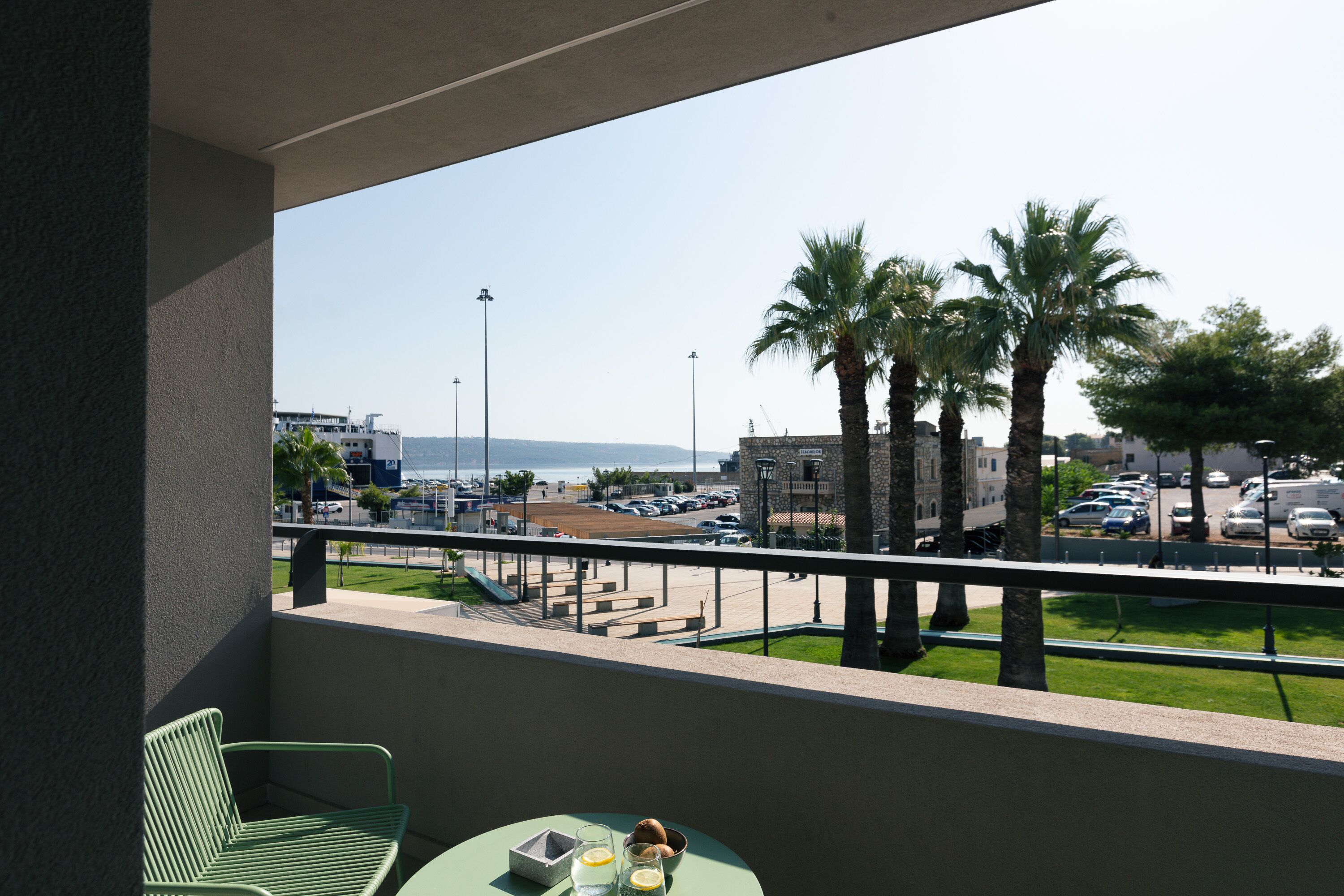 Exclusive Triple Room | Living area | Flat-screen TV