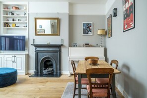 Apartment, 1 Bedroom | Living area | Smart TV