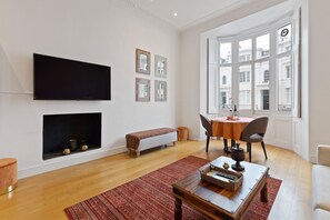 Apartment, 1 Bedroom | Living area | Smart TV - JOIVY Elegant 1-Bed Flat In Bayswater (London)