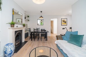 Apartment, 2 Bedrooms | Living area | 24-inch flat-screen TV with cable channels - JOIVY Stylish 2-Bed Flat W/ Private Garden In Notting Hill, (London)