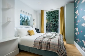 Maison, 4 chambres | 4 chambres, fer et planche à repasser, accès au Wi-Fi (inclus)