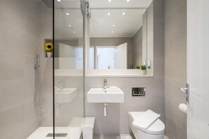 Apartment, 2 Bedrooms | Bathroom | Shower, free toiletries, hair dryer