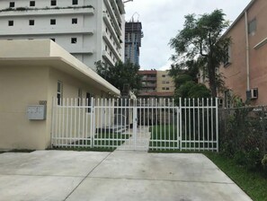 Access the serene residential complex through this secure entrance.
