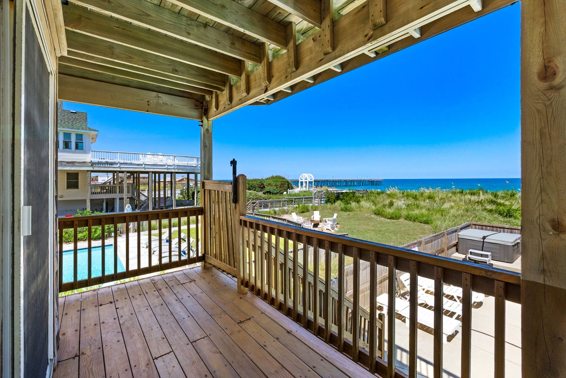 The covered Mid-Level Deck is perfect for enjoying those ocean breezes.