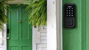 A green door with a keypad lock and a white mailbox. - Locktender Cottage · Historic cottage near Mohonk & Minnewaska, 2BR/2BA (High Falls)