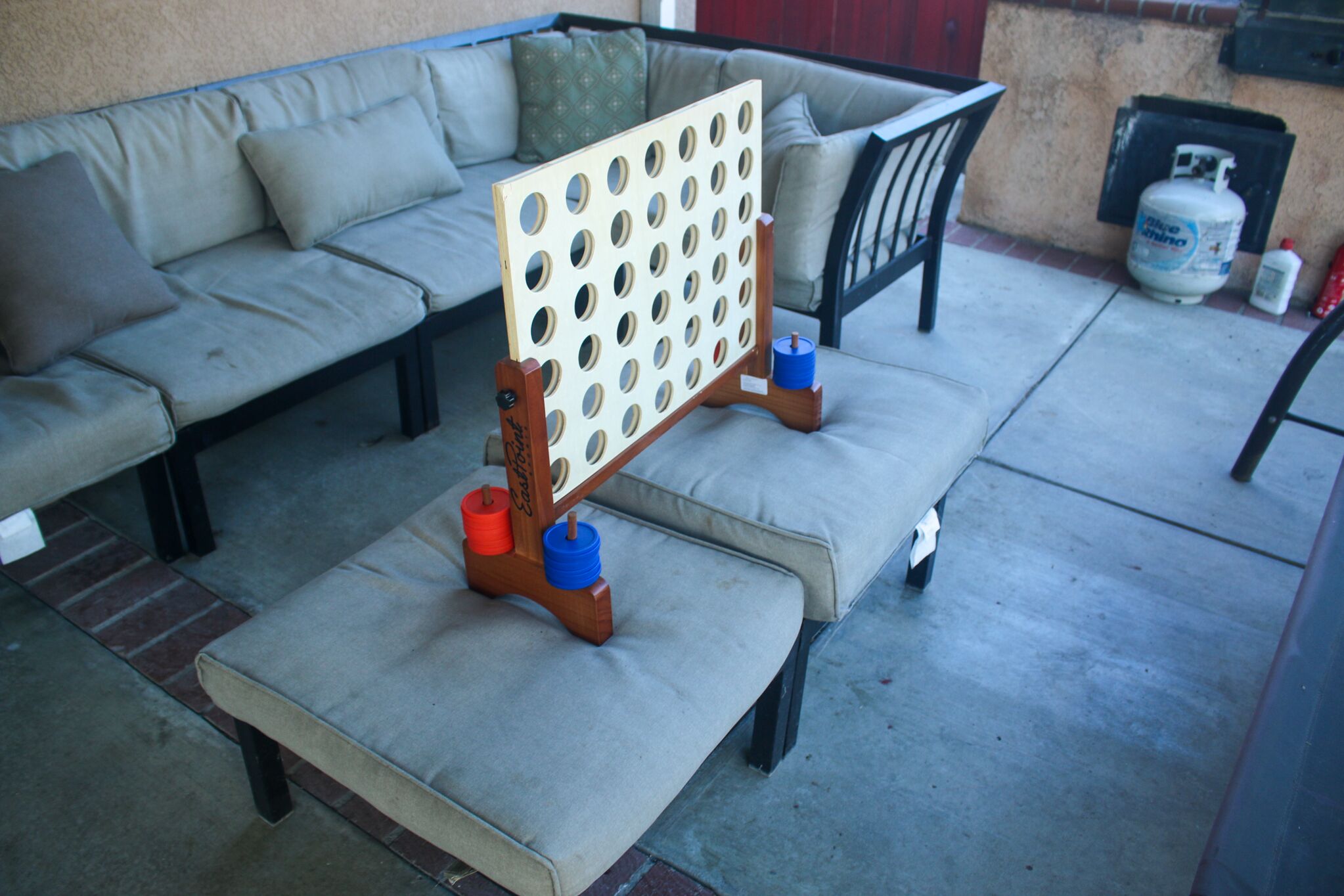 Giant connect-4 and comfortable outdoor seating 