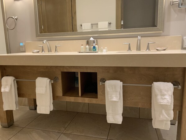 Combined shower/tub, hair dryer, towels, soap