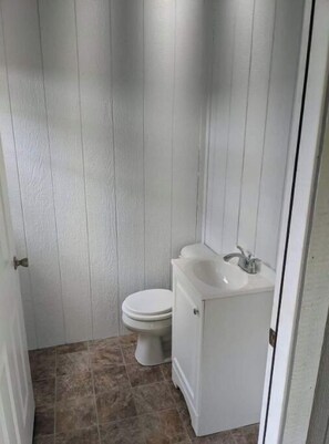 Bathtub, hair dryer, towels, soap