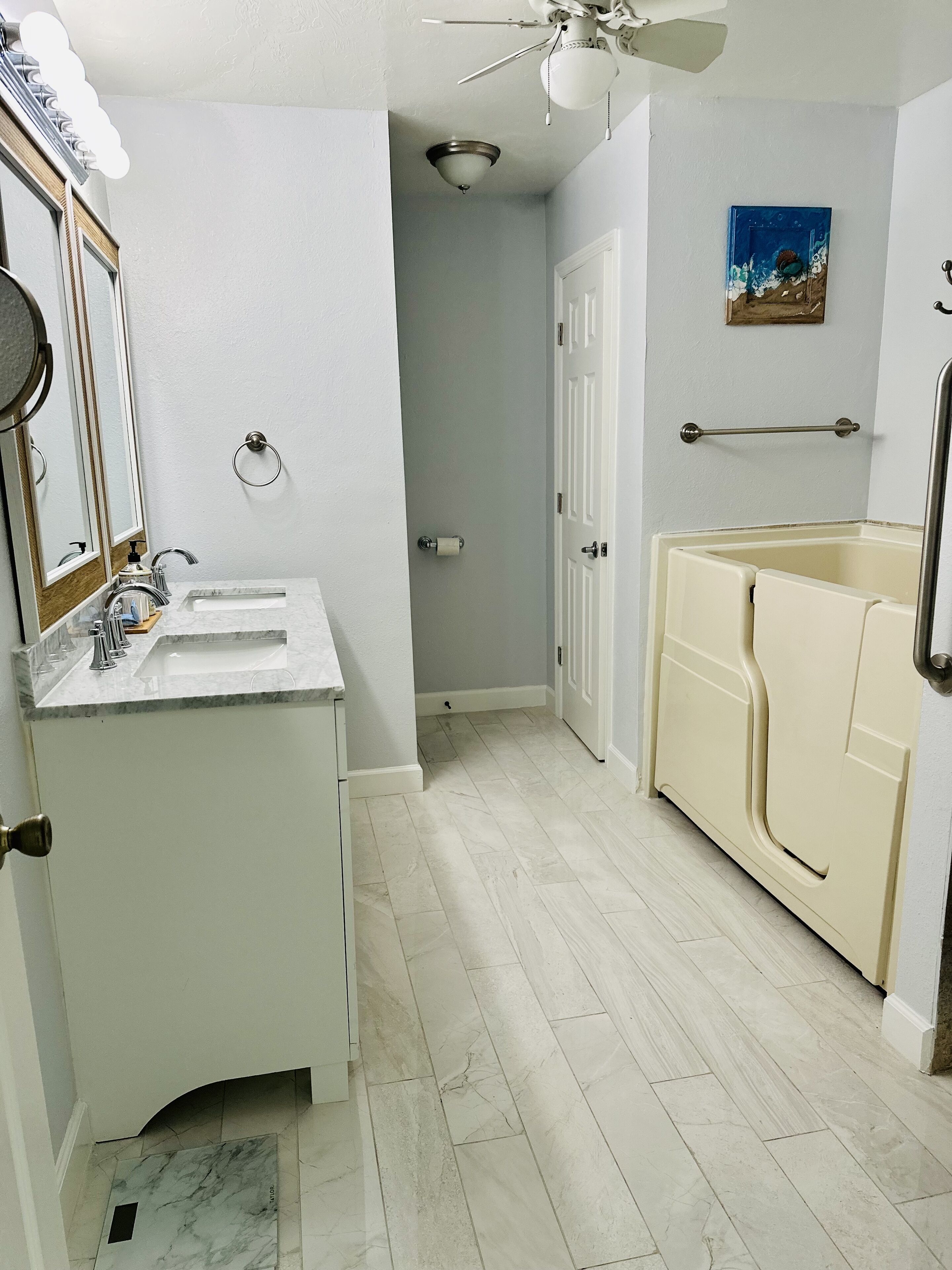 1st full bathroom with standup shower and sit in bath