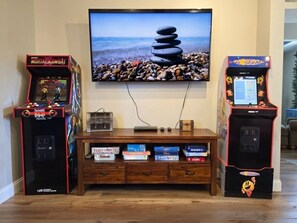 Game room - Charming 1920 Historic Home near Huntley Square with Arcade Games! (Huntley)