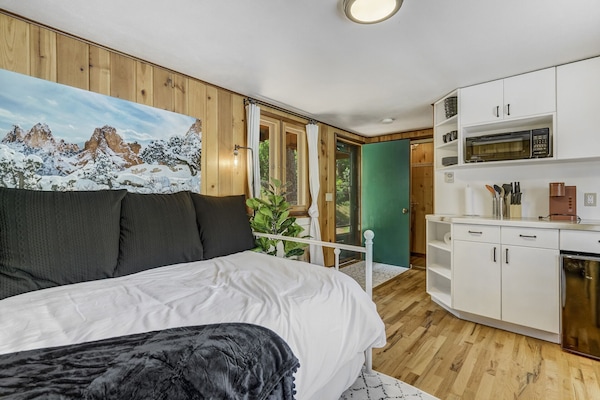 Queen bed has a twin pull out trundle bed.