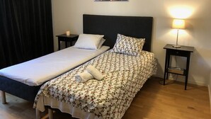 アパートメント シングルベッド 2 台 | 1 室のベッドルーム、WiFi (無料)、ベッドシーツ