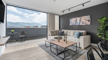 Apartment (508) | Living area | 50-inch Smart TV with cable channels, TV