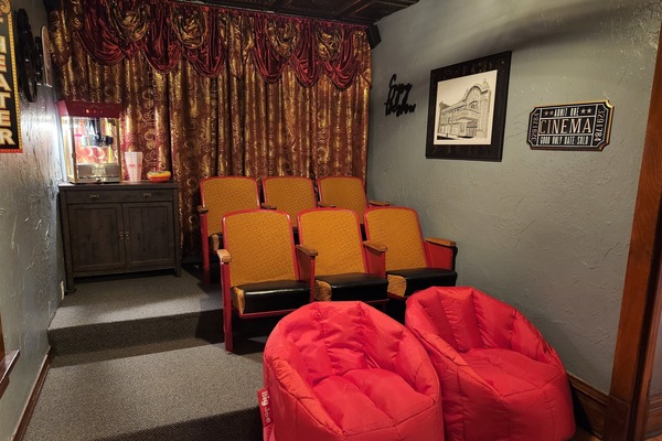Enjoy a one of a kind popcorn movie night in the vintage theater room!