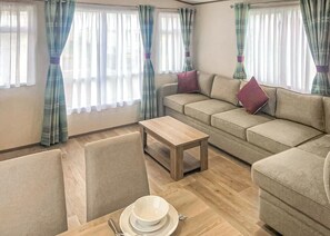 Living area - 12ft-wide caravan with one double with en suite W. (Chapel St Leonards, Skegness)