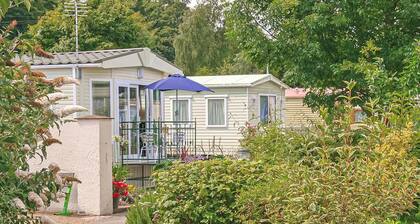Comfortable 12ft-wide caravan with one double and one twin.