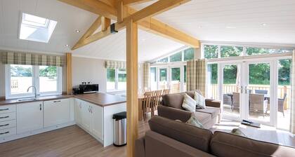 Luxury lodge with one double with freestanding bath.