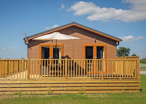 Luxury lodge with one double with freestanding bath.