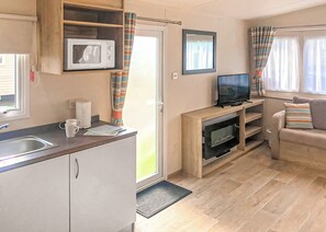 Unclassified image, 2 of 8, button - Caravan with one double and two twin. (Chapel St Leonards, Skegness)