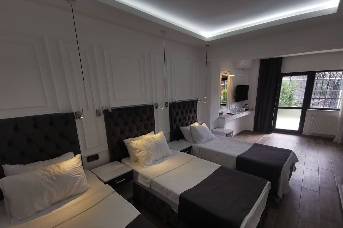 Family Room with Private Garden ( Underground Floor) | Egyptian cotton sheets, premium bedding, minibar, in-room safe