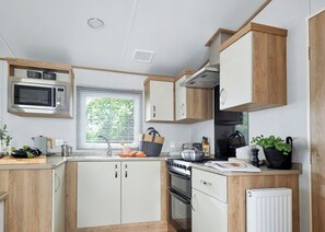 Geladeira, fogão, cooktop, torradeira