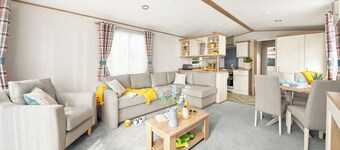 Stylish and modern 12ft-wide caravan with one double two one twin.