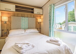 3 bedrooms, free WiFi - Stylish and modern 12ft-wide caravan with one double two one twin. (Mold)
