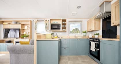 Stylish and modern 12ft-wide caravan with one double two one twin.