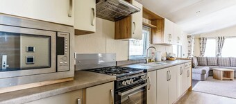 Modern and contemporary 12ft-wide caravan with two twin.