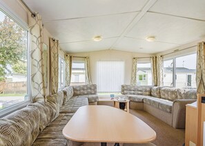 Unclassified image, 2 of 5, button - Comfortable 12ft-wide caravan with one double and two twin. (Bognor Regis)