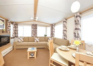 Living area - 12ft-wide caravan with one double and one twin. (Silloth)