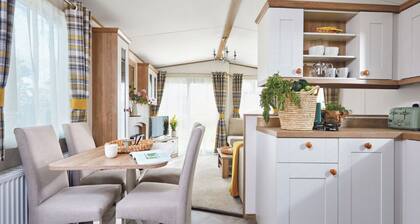 Spacious and luxurious 12-foot-wide caravan with one double and one twin.