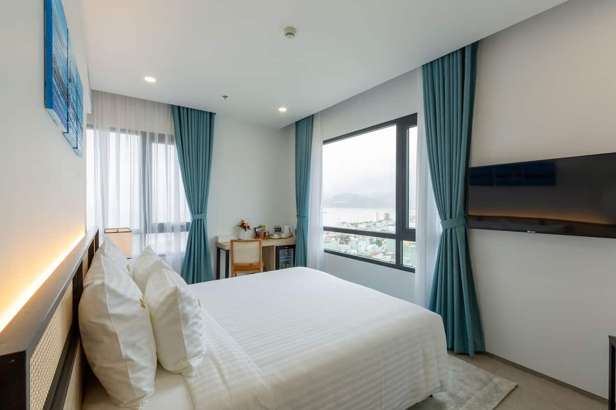 Suite, vista al océano | 1 habitación y ropa de cama de alta calidad