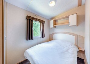 3 bedrooms - 12ft-wide caravan with one double and two twin. (Bognor Regis)