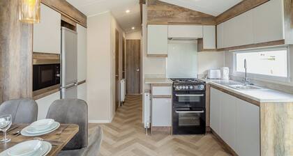 12ft-wide luxury caravan with one double and two twin.