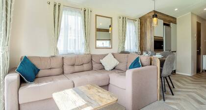 12ft-wide luxury caravan with one double and two twin.