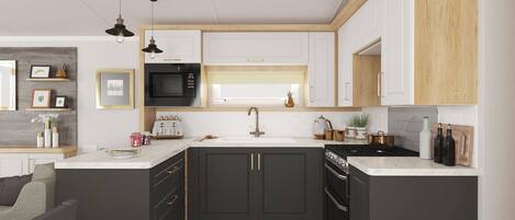 Een koelkast, een oven, een kookplaat, een broodrooster