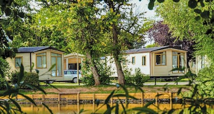 Mid range 12ft-wide caravan with one double and one twin.