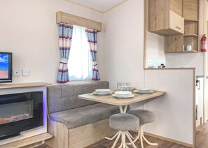Dining - Comfortable caravan with one double and one twin. (Chapel St Leonards, Skegness)