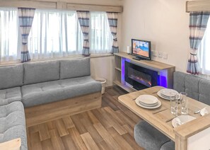 Living area - Comfortable caravan with one double and one twin. (Chapel St Leonards, Skegness)