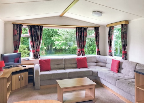 Luxury modern and spacious 12ft-wide caravan with one double and two twin.