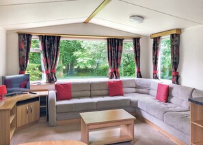 Living area - Luxury modern and spacious 12ft-wide caravan with one double and two twin. (Tavistock)