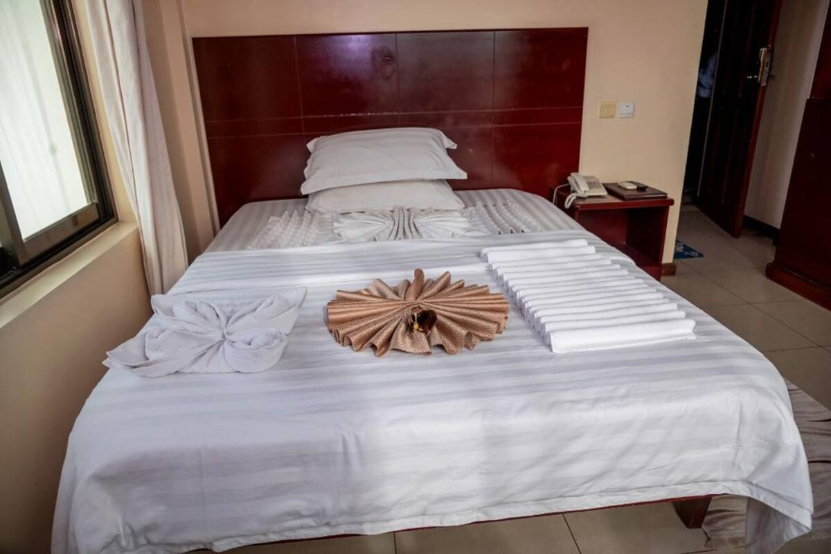 Blackout drapes, WiFi (free), bed sheets