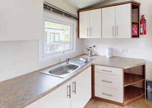 Fridge, oven, stovetop, toaster - Well presented 12ft-wide caravan with one double and one twin. (Clunderwen, Nr Narberth)